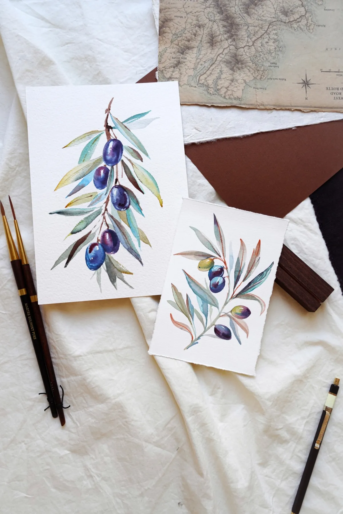 Aquarelle von Olivenzweigen auf handgeschöpftem Papier – NUAMÃO Studio Kollaboration